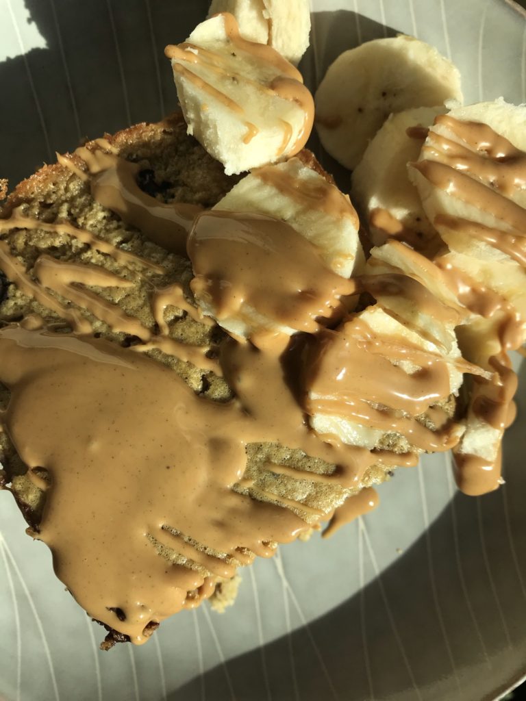 Chunky Monkey variation of my Instagram worthy chocolate chip cookie dough baked oats that are actually healthy recipe, I added melted PB and bananas to my base recipe