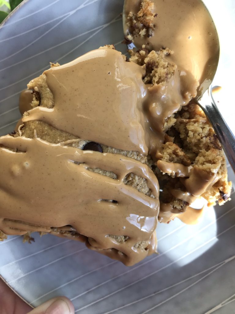 PB Cookie variation of my Instagram worthy chocolate chip cookie dough baked oats recipe, topping the base recipe with melted peanut butter